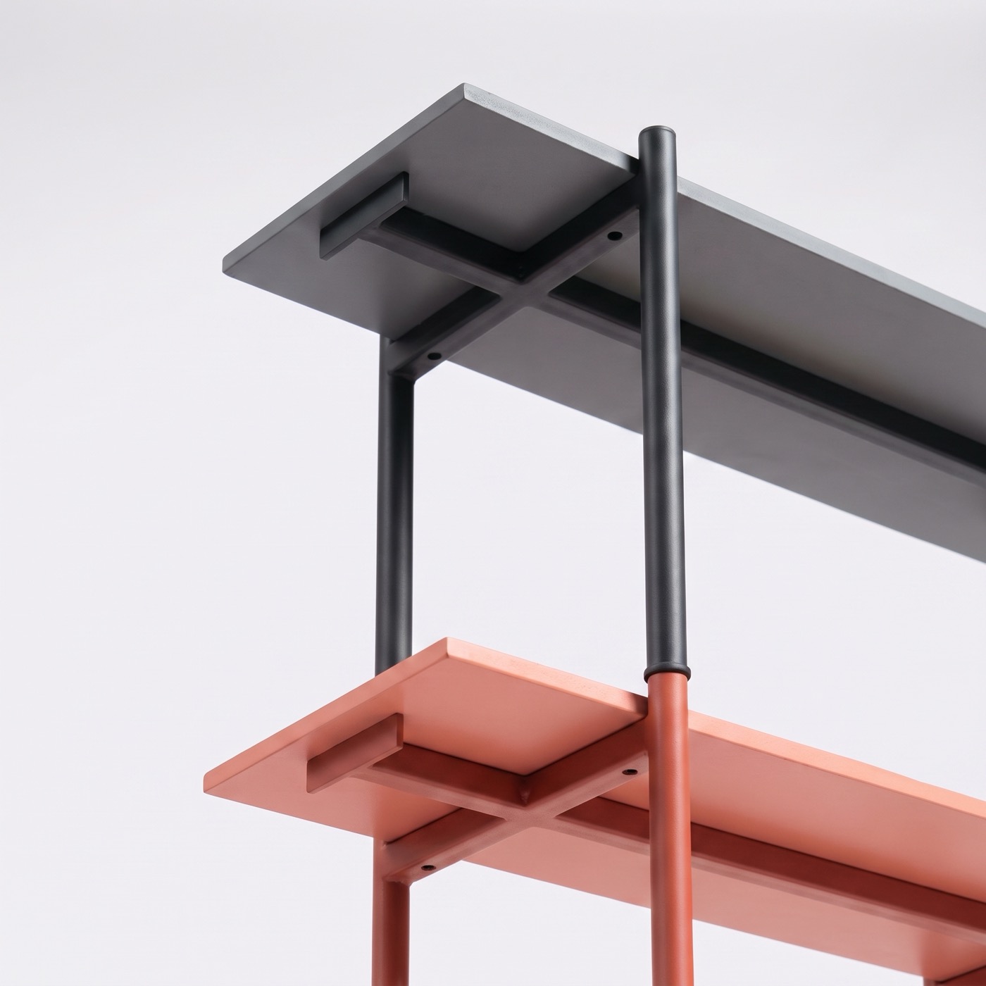 Close-up of the steel and MDF shelving underside crafted in Nairobi